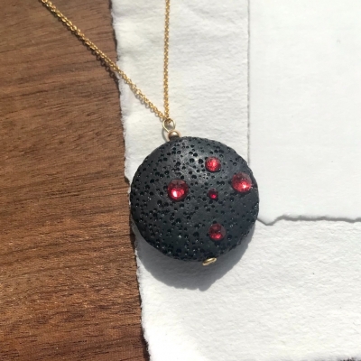 Magma Round pendant on 9ct gold