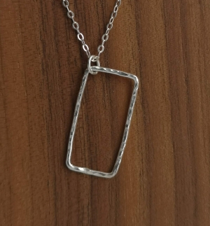 Strength pendant in silver